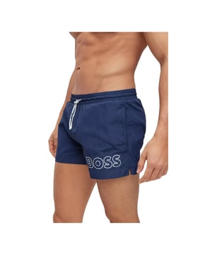 Mens Hugo Boss Mooneye Swim Shorts in navy.- Elastic waistband.- Side pockets.- Short length.- Plastic-tipped drawcords with further branding complete this pair.- Printed with a large BOSS logo.- 100% Polyamide.- Ref: 50469280413