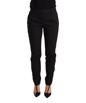 Marca: Dolce & Gabbana  
100% Auténtico  
Pantalones de cintura media  
Silueta ajustada  
Pliegues prensados  
Pantalones tapered  
Corte regular  
Material: 99% Lana Virgen 1% Elastano  
Color: Negro  
Cierre con cremallera y botón  
Detalles de logo  
Hecho en Italia  
Material: 99% Lana Virgen 1% Elastano
