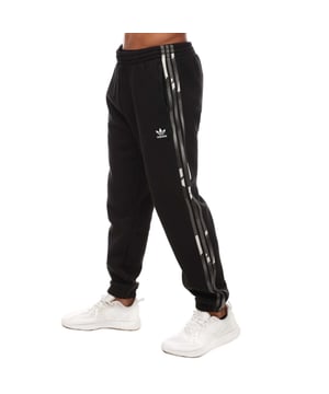 Mens adidas Originals Graphics Camo Sweatpants in black.- Drawcord on elastic waist.- Zipped pockets.- Camo-print 3-Stripes down the sides.- Ribbed cuffs.- Regular fit.- Main Material: 70% Cotton  30% Polyester (Recycled). Lining insert: 100% Cotton.- Ref: HR3529
