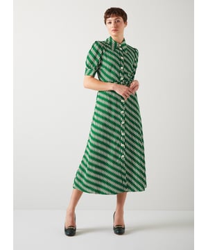A shirt dress is an LKB sigture, especially in the spring months, and the new Valerie dress in our Perfectly Petite* collection can go from smart to casual with ease, it's quite the wardrobe hero. Crafted from a lightweight, floaty fabric in green, white and black with a vintage archive modernist print, it has a long rounded collar, puff shoulders, short sleeves, cream buttons, a buckled belt, a back yoke and a midi-length skirt. Wear it with a chunky court by day and something strappier for dressier moments. 

*Perfectly Petite
Our Perfectly Petite range is crafted for a flattering fit on those 5’3” and below. Not simply graded down, our petite collection is caully measured to ensure the perfect fit across every piece of clothing. Dress confidently in love-forever, investment pieces made with you in mind and bring the extraordiry to the ordiry, everyday.