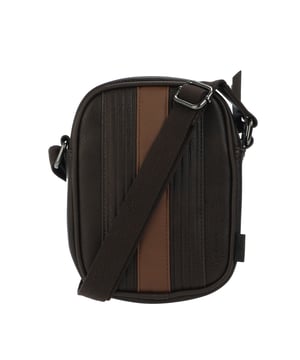 Mens Ted Baker Evver Striped PU Flight Bag in brown.- Adjustable shoulder strap.- Zip fastening.- Stripe detailing.- Ted Baker debossed detail.- Ted Baker-branded.- Shell: 100% Polyurethane. Lining: 100% Polyester.- Ref: 256435BRNCHOC