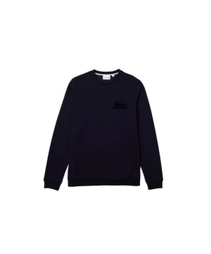 Unifarbener Rundhals-Pullover mit Rippabschlüssen an den Ärmelbündchen und Label-Print in normaler Passform.