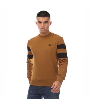 Mens Fred Perry Tipped Sleeve Sweatshirt in camel.- Ribbed crew neck.- Ribbed cuffs and hem.- Stripe detailing.- Embroidered logo.- Regular fit.- 100% Cotton.- Ref: M5544644
