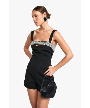 Stunning hand-embellished rhinestone detailing
        Chic square neckline for a modern touch
        Flattering mini length to showcase your legs
        Wide straps for comfortable support
        Sleek playsuit design for effortless style
    
    Make a dazzling entrance at your next festive celebration with this show-stopping playsuit. The hand-embellished rhinestone detailing across the bodice adds a touch of glamour, perfect for catching the light as you dance the night away. The square neckline and wide straps offer a contemporary silhouette, while the mini length allows you to flaunt your legs with confidence. Style this versatile piece with strappy heels and statement earrings for a Christmas party look that commands attention. For a more relaxed Christmas Day outfit, pair it with opaque tights and ankle boots. The playsuit's sleek design ensures you'll feel comfortable and look fabulous throughout the festivities, whether you're opening presents or enjoying a festive meal with loved ones.