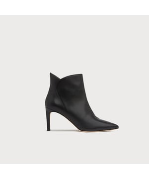 A sharp and sexy ankle boot, Maja is back this winter in classic black. Crafted in Spain from beautifully-soft nappa leather, Maja has a pointed toe, a shapely cut over the ankle and a stiletto heel. Looking as good with tailoring as with more relaxed, feminine pieces, its an L.K.Bennett favourite.