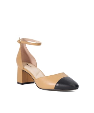 Careless combines the timelessness of this season's round toe ballet profiles with the elevation of a mid-height block heel. Crafted from premium leather, Careless has been designed with a contrasting toecap and an adjustable ankle strap. A chic yet contemporary open court suited to formal styling and smart off duty dressing.