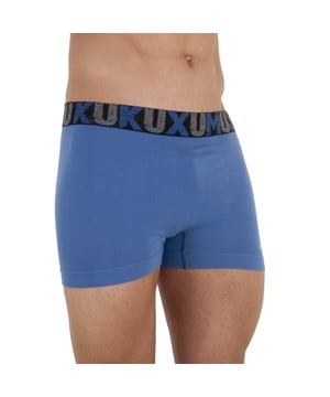 Boxer Kukuxumusu.
 Illustrations of the brand as decoration on the boxer briefs.
 Elastic waistband with the brand name printed consecutively.
 Matching seams.
 Composition: 85% Cotton, 9% Polyamide, 6% Elastane
 Care:
Care:
 - Machine wash maximum 30ºC.
 - Do not use bleach.
 - Iron at low temperature.
 - Do not use dryer.
 - Do not dry clean.