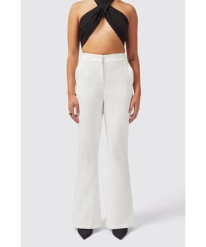 Refresh your wardrobe with the Fiore Trouser in White. Cut to a flared fit it features a jacquard print for added texture and made from a cotton blend to keep you cool. With its classic tailoring it's a great new addition to your collection. Pair it with the matching Fiore Jacket in White to complete the full look.
Model is 5'6" (168cm), chest 32" (81cm), waist 27" (69cm) and wearing a size 8.