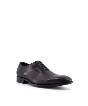 Formal settings call for our Secrecy pair, designed in soft, matte leather. This sophisticated style has a slim silhouette and laces up to fasten. Ideal for the office or special events.