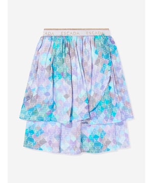 Introducing the luxurious Girls Layered Skirt in Blue by Escada ‚ the epitome of style and elegance for AW2024. Crafted with exquisite attention to detail, this skirt is an essential addition to any young fashionista's wardrobe: Exquisite Layered Design: Multiple layers create a beautiful, flowing silhouette that moves gracefully with every step. Vibrant Blue Hue: A rich, captivating blue tone that complements any outfit and stands out in any setting. Premium Materials: Constructed from the finest fabrics, ensuring durability and comfort for all-day wear.Enhance your girl's wardrobe with the sophisticated charm of the Escada Girls Layered Skirt in Blue. Perfect for special occasions or stylish everyday wear. Order now and elevate her style!