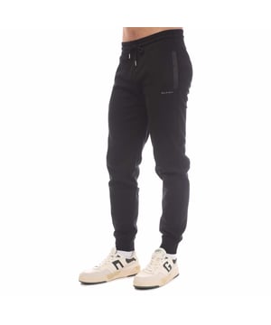 Mens Belstaff Cotton Fleece Alloy Sweatpants in black.- Waist channel drawcord.- Side seam pockets.- Back welt pocket.- Silicone Belstaff logo on left front.- Gunmetal hardware.- A compact double face knitted interlock sweatshirt fabric with technical shell trims.- Regular fit.- 100% Cotton.- Ref: 105241BLACK