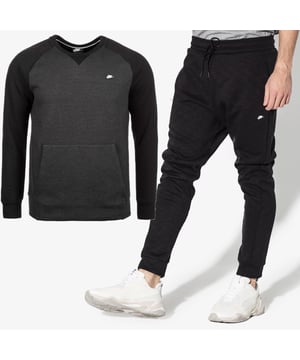 Der Nike Sportswear Optic Herren Fleece Crewneck Trainingsanzug hat einen hohen Baumwollanteil, ist sehr weich und angenehm zu tragen, schränkt die Bewegung nicht ein und speichert die Wärme perfekt. - - .   Raglan ist aus Polyester, die Verschleißfestigkeit, Pflegeleichtigkeit, Elastizität und Haltbarkeit bietet. - - .   Das Modell wird nicht nur bei Sportlern gefragt sein, sondern auch bei denen, die diesen Kleidungsstil einfach für jeden Tag mögen. - - .   Die Baumwolle im Produkt fühlt sich angenehm an, "atmet" gut, gibt ein Gefühl von Natürlichkeit und Komfort, und die Kängurutasche wärmt Ihre Hände bei kaltem Wetter. - - .