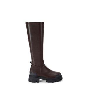 The KG Kurt Geiger Trekker Sock Knee arrives in a brown with a soft high ankle. The back of the ankle features both a KG Kurt Geiger logo printed on ribbed textile with print stitch detailing as well as an embossed rubber monocle.