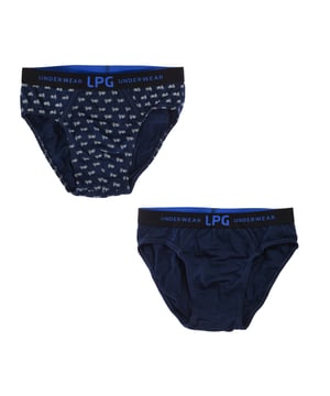 Set-2 Slips.
 Kleur Blauw - gedessineerd blauw
 Elastische tailleband met geborduurd logo.
 ademende stof
 Anatomische voorkant met de mogelijkheid om vast te houden zonder te knellen.
 Naden in toon zichtbaar.

 Samenstelling: 95% Katoen, 5% Elastaan

 Onderhoud:
 - Wassen op max. 30º.
 - Niet bleken.
 - Niet in de droger.
 - Niet strijken.
 - Niet chemisch reinigen.