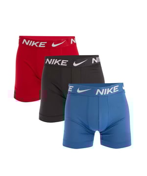 Mens Nike Dri-FIT Essential Micro 3 Pack Boxer Trunks in Gym Red - Court Blue - Black.- Comprises one pair x Gym Red  one pair x Court Blue  one pair x Black boxer briefs.- Smooth  sweat-wicking microfibre.- Nike Dri-FIT technology helps you stay dry and comfortable.- Stretch material enhances your freedom of movement.- Wide hems help keep underwear in place.- Nike branding at waistband and left leg.- 92% Reprocessed polyester  8% Elastane.  Machine washable.- Ref: 0000KE1156612We regret that underwear is non-returnable due to hygiene reasons.