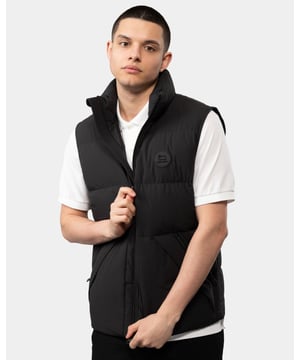 Get ready for your next winter adventure with the men’s Sierra Supreme Vest, specially designed to protect you from the elements. Crafted from four-way stretch nylon with a refined matte finish, it's insulated with soft duck down, injected directly for superior comfort and unrivalled performance. Finished with horizontal quilting to lock in the heat and roomy pockets to keep your essentials in hand: key Woolrich details that make this sophisticated style a smart addition to any winter edit.
Made from four-way stretch nylonRDS certifiedWater-resistantInsulated with 90/10 duck down using a direct injection techniqueHorizontal quiltingTwo-way zip fasteningStand collarDiagonal zip pocketsInternal pocketLogo patch on the chest
Outer fabric: 86% Polyamide, 14% ElastaneInner Fabric: 100% PolyamidePadding: 90% Grey Duck Down, 10% Feather



WOOU0612