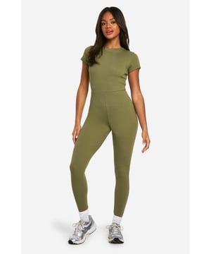 Just chillin? Keep things simple this season in this casual jumpsuit from boohoo. Laidback, comfy, and the perfect throw-on piece, pull off effortless vibes with a casual jumpsuit. Choose from casual jersey jumpsuits with ribbed detailing or opt for a loungewear jumpsuit in new-season hues. Heading on a cinema date? This style is your perfect option. From sweat jumpsuits to belted styles, just pair with chunky trainers or socks and sliders and you're sorted. Comfort heaven = achieved.Style: UnitardFabric: CottonLength: RegularSleeve Length: SleevelessModel's height: 168cm / 5'6"