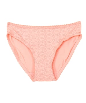 Microvezelslip voor meisjes.
 Roze kleur
 Elastische tailleband.
 Detail van de merknaam op het hele ontwerp gedrukt.
 Ademende stof.
 Naden in toon zichtbaar.

 Samenstelling: 91% polyamide, 9% elastaan

 Onderhoud:
 - Wassen op max. temperatuur. 40º.
 - Geen bleekmiddel gebruiken.
 - Niet in de droger.
 - Niet strijken.
 - Niet chemisch reinigen.
 Samenstelling: 91% polyamide, 9% elastaan
 Onderhoud:
Onderhoud:
 - Wassen op max. temperatuur. 40º.
 - Geen bleekmiddel gebruiken.
 - Niet in de droger.
 - Niet strijken.
 - Niet chemisch reinigen.