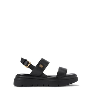 This pair of Kurt Geiger Chunky Strap Sandals feature a black upper with micro antiqued brass eagle head and buckle fastening on the slingback strap. The sole is extra chunky with padding for support.