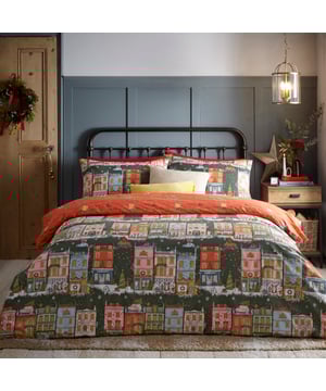 Inspired by traditional, heritage shops, the Christmas Spirit duvet cover set is adorned with Christmas décor and snow. The design features visual delights such as a magical street scene, snow-covered telephone boxes and a car overloaded with presents and much more to see! For more festive fun, the reverse features lines from your favourite carols. The perfect addition for the seasonal period!
