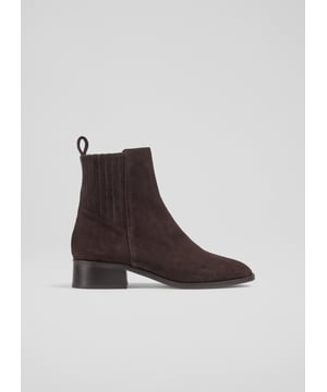 Experience sophistication with the Rosella ankle boots in rich espresso suede. Featuring a classic chelsea design with elasticated sides, the chelsea elasticated boot has an almond toe, welt sole and a sturdy block heel. They are lined with leather for ultimate comfort. Perfectly versatile, pair them with tailored trousers for a smart look or dress them down with your favourite jeans.