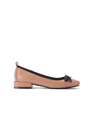 The KG Kurt Geiger Marvyn is a camel ballet flat with black bow on the toe and flat block style heel.