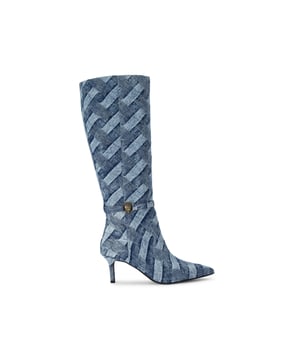 This Kurt Geiger Kensington Flexi Knee High boot features a woven denim upper with pointed toe. There is an antiqued brass eagle head on the slim ankle strap. The sole has added flexibility for a unique comfort. Heel height: 6.5cm.