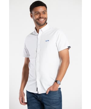 Elevate your casual style with this oxford shirt from Tokyo Laundry. Made from 100% cotton, this short-sleeved shirt is perfect for any occasion. The classic design features a comfortable fit and button fastening. Add this versatile staple to your wardrobe today. Machine washable for easy care.