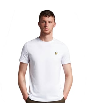 Crafted from 100% cotton from unrivalled softness, the Lyle & Scott Plain T-Shirt is an iconic style and the definition of a wardrobe staple. Featuring a classic silhouette, detail stitching at collar and cuff, plus our signature Golden Eagle, this t-shirt can be seamlessly layered or stand alone as the centrepiece of any smart-casual outfit.  
  
Fit: Regular
It is crafted to fit the body neither too tightly or too loosely, leaving you with a classic, timelessly stylish look. We recommend you order your usual size, but if you're caught between two, go a size up.
