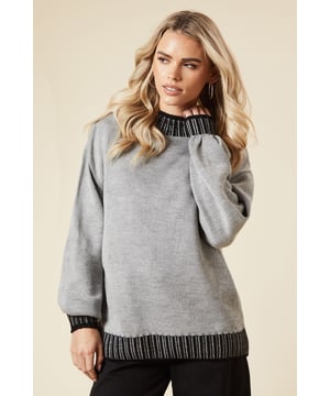 Cosy high neck design for extra warmth
        Distinctive whipstitch detailing on neckline and cuffs
        Relaxed fit with dropped shoulders for comfort
        Contrasting ribbed trim adds visual interest
        Versatile petite sizing for a perfect fit
    
    Embrace comfort and style with this charming high neck jumper, perfect for the fashion-conscious woman who values both trend and practicality. The whipstitch detailing along the neckline and cuffs adds a unique touch, setting this piece apart from your average knitwear. Its relaxed silhouette with dropped shoulders ensures ease of movement, ideal for busy days or relaxed weekends. Style this versatile jumper with wide-leg trousers and trainers for a casual brunch with friends, or dress it up with a midi skirt and ankle boots for a baby shower. The contrasting ribbed trim at the hem and cuffs creates a polished finish, making it suitable for various casual occasions. Whether you're running errands or meeting family for a cosy gathering, this jumper will keep you looking effortlessly chic while feeling wonderfully snug.