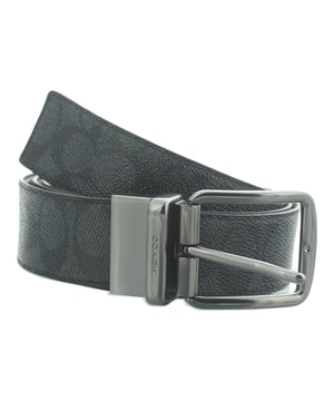 Harness Buckle Reversible Belt from Coach has a textured mahogany pebble leather finish on one side and coated canvas on the reverse. This refined belt can be cut to size and has two great looks
