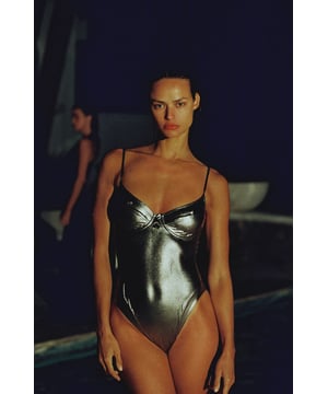 Energise your swimwear collection with this metallic swimsuit. Featuring our signature LET'S SWIM shark logo to the chest, underwired support, and fuller coverage to the groin, this standout piece is innovatively designed for beach parties, ocean escapades and beyond. Be at one with the shimmering waters in this reflective piece.