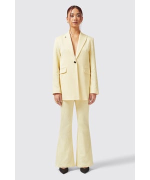 Brighten up your wardrobe with the Fiore. A vibrant staple for every occasion this season. This lemon yellow is guaranteed to make a statement, crafted from a cotton blend to keep you cool. It features a light contrasting jacquard print, wide peak lapel and welt pockets for added impact.  Pair it with the matching Fiore Trousers in Lemon Yellow to tick all of the boxes.
Model is 5'6" (168cm), chest 32" (81cm), waist 27" (69cm) and wearing a size 8.