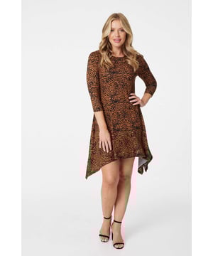 Add a statement animal print swing dress to your cosy jumper dress collection. With a round neck, 3/4 sleeves, and a hanky hem sitting above the nee. Style with heels for an elevated yet casual outfit or dress down with trainers.