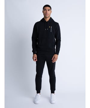 This tracksuit from LUKE is sure to keep you looking cool and feeling comfortable. Both the hoodie and joggers are cut from a soft cotton mix fabrication and detailed with ribbed trims. They are both completed with the brands iconic lion head embroidery.