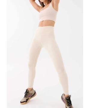High waisted, 7/8 length leggings. Buttery soft fabrication with built in waistband support. Reflective P.E Naion gold heat press on ankle