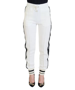 Marca: Dolce & Gabbana  
Modelo: Pantalones Jogger  
Color: Blanco  
Material: 61% Viscosa, 46% Acetato, 3% Elastano  
Detalles de logotipo  
Hecho en Italia