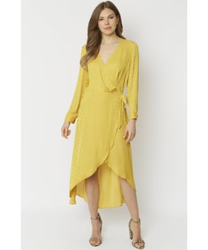 Comfortably fits sizes 8-14 depending on desired fit.

Feminine and elegant, this midi wrap dress is just what your summer occasions called for. Featuring a flattering tie waist, v-neck and full length sleeves, this dress is crafted from a lightweight, soft silk blend that floats when you walk. One we're sure you'll love.