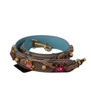 100% authentic Dolce & Gabbana leather shoulder bag strap
  Made of Quality python leather in a beautiful brown hue
  Two gold-tone lobster clasps for easy attachment
  Iconic Dolce & Gabbana logo details
  Made in Italy with exquisite craftsmanship
  Measurements: 70cm x 3cm
Material: 100% Python Leather