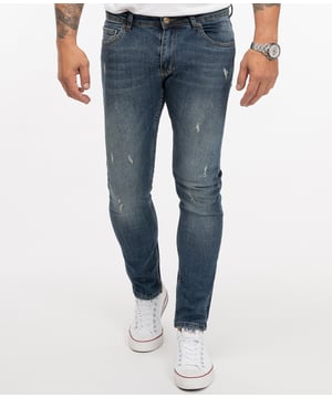 Ein Klassiker für Arbeitsalltag, Freizeit und Urlaub ist die Blue Jeans im Slim Fit! Viele unserer hell- bis dunkelblauen Herren Jeans gefallen mit coolen Waschungen im Used-Look. Die lässig sitzenden Hosen verfügen über gerade geschnittene Beine, das typische 5-Pocket-Design und ein Rock-Creek Patch. Neben praktischen Bundschlaufen besitzen sie einen Verschluss mit Knöpfen oder Zipper