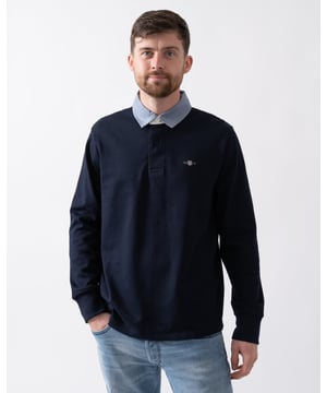 With a small-scale GANT shield graphic embroidered at the chest, this heavy rugger is made from 100% cotton and tailored for a regular fit. Its timeless, classic look is enhanced by a classic twill collar and a hidden button placket, making it versatile enough for any occasion.



Regular fit
Twill collar
GANT graphic embroidered at chest
Wash with similar colors.

 100% Cotton 
 
2004082


 