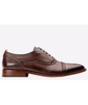 Cast is a men's Oxford shoe from Base London. This brogue features intricate hole punch detail on the toe cap and along the upper. The closed lacing oozes class & the comfy Ortholite Inner sole will keep your feet comfy and dry.
- Leather upper
- Classic brogue detailing
- Secure lace fastening
- Ortholite footbed
- Durable rubber outsole