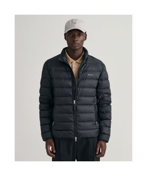 Crafted from a lightweight recycled polyester with a water-repellent finish, Gant Light Down Jacket is the perfect layering piece for sudden drops in temperature. This jacket is fully lined and has one interior patch pocket and one interior zip pocket.
Regular fit  Straight channel quilting  Water-repellent  Locker loop with logo at back
Shell - Recycled Polyester 100%, Lining - Recycled Polyester 100%, Padding - Down 90%, Feathers 10%
7006298
&nbsp;