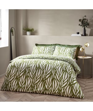 Enjoy some natural sleep in the modern, abstract art-inspired Frond duvet cover set. Featuring a linear leaf design, using fluid painted lines to create movement and texture to your interior. The reverse displays intricately printed fronds on a natural green background, to give you a choice of two nature-inspired designs in one. Either way, the Frond duvet cover set adds a touch of nature to a modern, neutral interior. This product is certified by OEKO-TEX® showing it has been sustainably made.