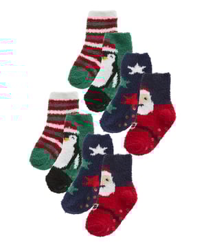 What's better than a pair of luxury Christmas Slipper Socks? A whole 8 pack! That's right, with these Kids Xmas Socks, you'll be able to keep your little ones cosy and stylish all holiday season. Get your kids (or even someone else's as a gift) to step up their game. These Cosy Xmas Socks are the ideal gift or even stocking filler for the festive season. They’ll be sure to love them brightening up their feet. These socks are made from a soft, comfortable and plush fluffy material, making them perfect to wear even during the colder days. They come in a 8 pair multipack which is great value for money for stocking up that sock drawer in time for the Xmas period. With anti-slip gripper dots on each foot, they'll stay put on their feet as they hop around in excitement at Santa's arrival. There are 4 festive designs per pack of Penguins & Stripes or Santa Claus and Stars. These socks come in packs of 8 with 4 festive patterns per pack. They’re made from 98% Polyester & 2% Elastane, are available in 4 Kids Sizes: 2-3 Years, 4-6 Years, 7-10 Years and 11-14 Years, they are machine washable..