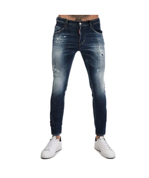 Jean Dsquared2 Paint pour homme en bleu denim.- 5 poches.- Fermeture boutonnée.- Effet éclaboussures de peinture.- Patchs contrastés.- Détail déchiré emblématique. - Coupe slim.- 98 % coton, 2 % élasthanne.
