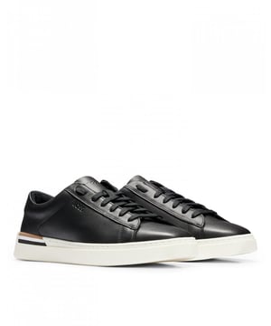 &nbsp;Everyday cupsole trainers in smooth leather with embossed logos and a signature-stripe detail at the sole by BOSS. For our RESPONSIBLE products, we always use at least 60% more sustainable raw materials. A minimum of 60% of the leather used to make this product has been sourced from certiﬁed tanneries using low-impact methods, for a reduced impact on the environment. By purchasing this product, you are supporting responsible leather manufacturing through the Leather Working Group (LWG). We only use skins and hides which are by-products of the food industry.LacesFully linedPackaging: Box
50502885