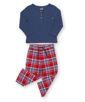We're delighted to share these very special organic cotton pyjamas that will help your little one snooze in comfort and style. Offering the softest, single jersey grandad style top with coconut button details in classic navy blue, and super-soft red and navy blue brushed check trousers for next-to-skin comfort and kindness.