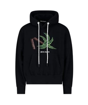 Palm Angels Broken Palm Tree Black Hoodie. Step out in classic style with the Palm Angels Black Hoodie. Crafted from 100% cotton in Italy, it features a regular fit that's true to size. The hoodie is detailed with a bright Palm Tree Logo and large branding, plus an embroidered logo. Elasticated waist and sleeve endings add extra comfort. Start your day off in comfort and style.. Regular Fit, Fits True To Size, Palm Angels Black Hoodie. Palm Tree Logo and Large Brading, Embroidered Logo, Drawstring Adjustable Hood, Large Front Kangaroo Pocket. 100% Cotton, Made In Italy, Long Sleeve, Elasticated Waist and Sleeve Endings. Style Code: PMBB058S22FLE017 1055