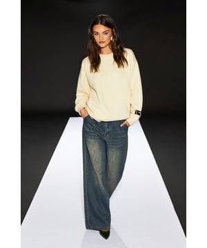 Oversized fit for ultimate comfort and style
        Round neckline for a classic look
        Long sleeves with ribbed cuffs for a snug fit
        Distinctive Runway 1.8.1.8 branding on sleeve
        Versatile design suitable for various casual occasions
    
    Make a bold statement with this Runway 1.8.1.8 Oversized Sweatshirt. This piece embodies confidence and edge, perfect for the modern woman who values both comfort and style. The relaxed silhouette allows for effortless layering, making it an ideal choice for those in-between seasons. Pair it with wide-leg jeans and trainers for a laid-back weekend look, or dress it up with leather trousers and ankle boots for an evening out with friends. The subtle branding on the sleeve adds a touch of exclusivity, whilst the cotton-blend fabric ensures breathability and durability. Whether you're running errands, meeting for coffee, or enjoying a casual family gathering, this sweatshirt will keep you looking effortlessly chic and feeling utterly comfortable.